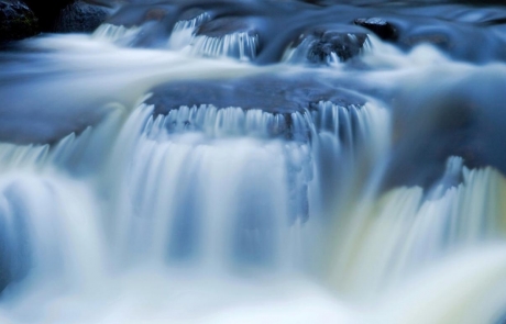 water flowing over boulders in Galloway Forest Park